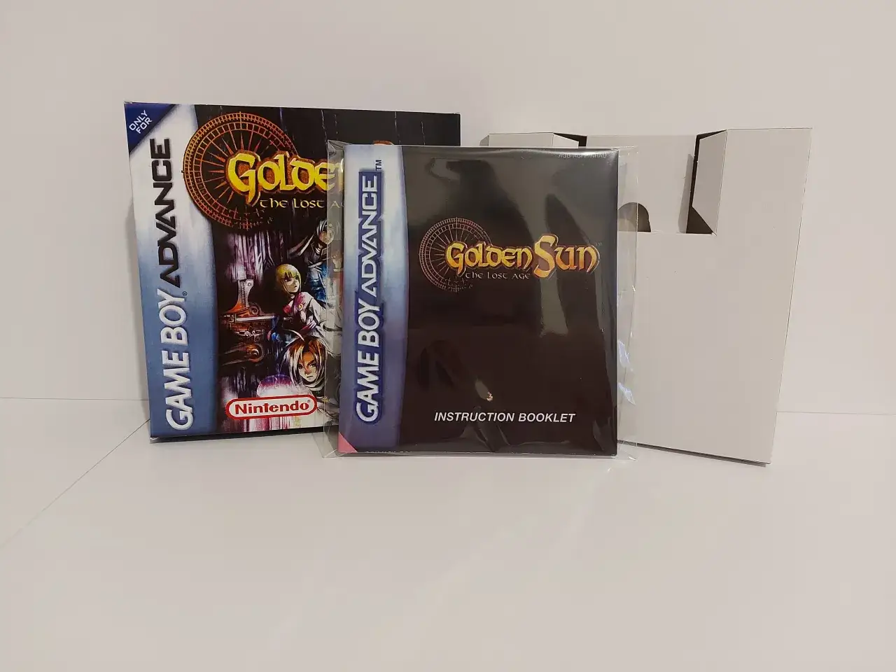 Pudełko gry Golden Sun: The Lost Age na Game Boy Advance i instrukcja.